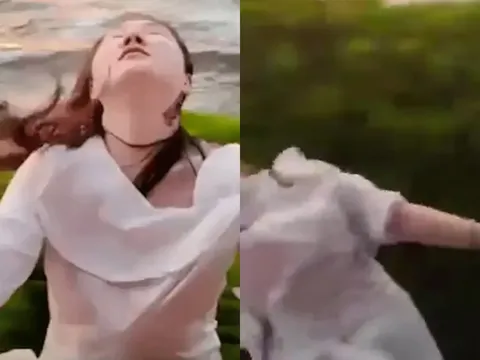 Clip: Thò ra ngoài cửa sổ chụp ảnh, người phụ nữ mắc vào cành cây bị kéo ra khỏi tàu đang chạy nhanh