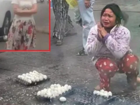 Video gây phẫn nộ: Va quệt nhẹ ô tô, nữ tài xế thẳng tay đập vỡ trứng của người bán hàng rong, thay cho tiền bồi thường