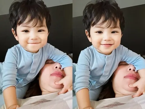 Quỳnh Thư trêu con trai "già chát", quý tử gần 1 tuổi xinh như con lai, mái tóc xoăn tự nhiên không tốn tiền uốn