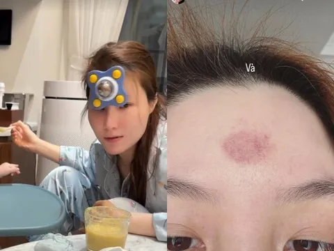Diễm My 9X chăm con trai đến bầm tím cả trán, quý tử chưa tròn 1 tuổi đã phải học cả "núi sách"