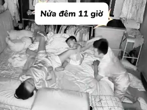 Đợi con ngủ say, cặp vợ chồng quay sang ôm nhau, đứa trẻ liền có hành động khiến ai cũng bật cười