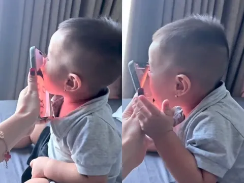 Bạn gái Quang Minh khoe cảnh con hôn tới tấp vào điện thoại khi bố đi làm xa, quý tử bé xíu đã sống tình cảm