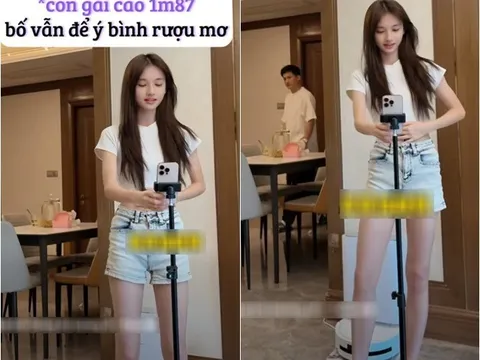 Bố làm vệ sĩ đứng canh vì con gái quá xinh đẹp mặc áo ngắn cũn livestream, ai cũng chỉ thắc mắc một điều