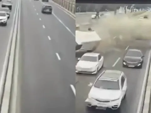 Hãi hùng clip ô tô mất lái lao qua rào chắn, rơi xuống đường vào giờ cao điểm