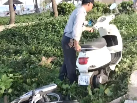 Sự thật về clip bảo vệ xô đổ xe máy du khách xuống bãi biển ở Đà Nẵng