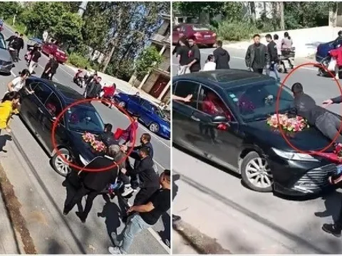 Chú rể ngỡ ngàng khi anh trai cô dâu chặn xe hoa, nằm dài trên capo đòi thêm 100 triệu đồng sính lễ giữa đường