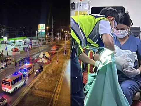 Đang trên đường đến viện, người mẹ bất ngờ sinh con ngay tại cây xăng giữa dòng xe kẹt cứng