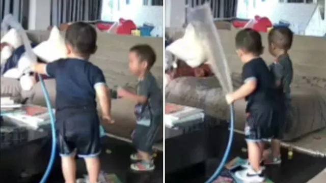 Clip: 2 "báo thủ" dùng vòi tưới cây... “rửa” phòng khách khiến mẹ dở khóc dở cười