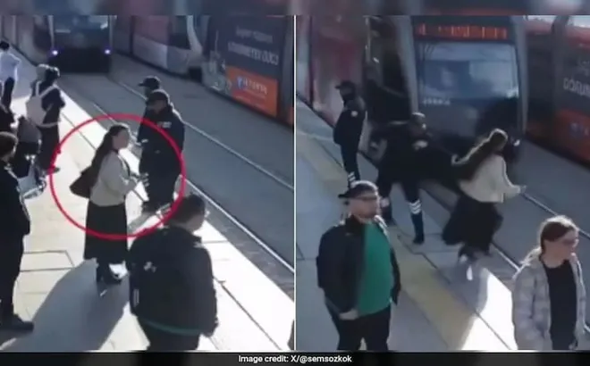 Video ghi lại cảnh bảo vệ lao đến, giữ lại người phụ nữ giúp cô thoát chết trước mũi tàu điện